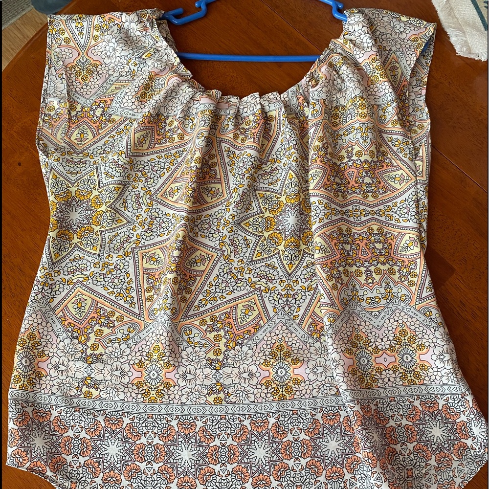 Lauren Conrad Dressy Sleeveless Blouse w/ floral pattern & keyhole tie in back.